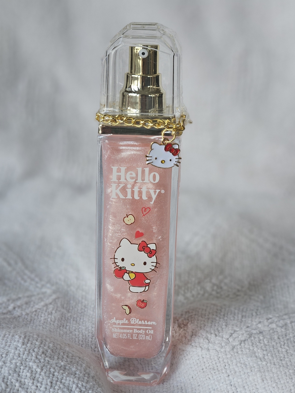 Hello Kitty Pearlescent Pink Shimmer Body Oil with Gold Charm